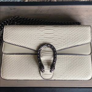 Cream faux snakeskin purse with metal chain